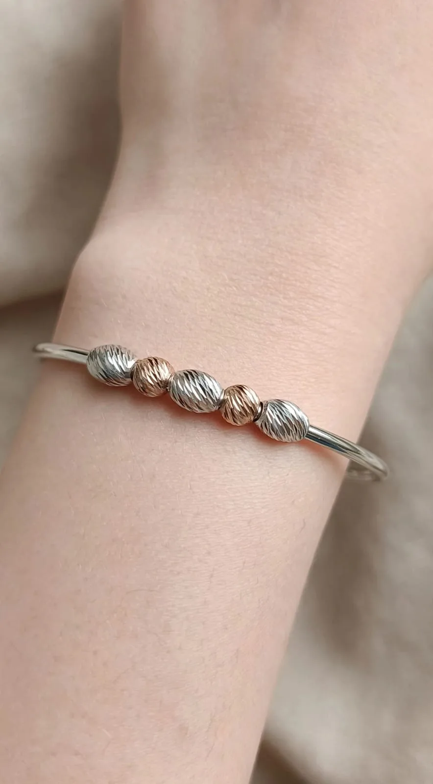 Two-Tone Ribbed Oval Bead Bangle